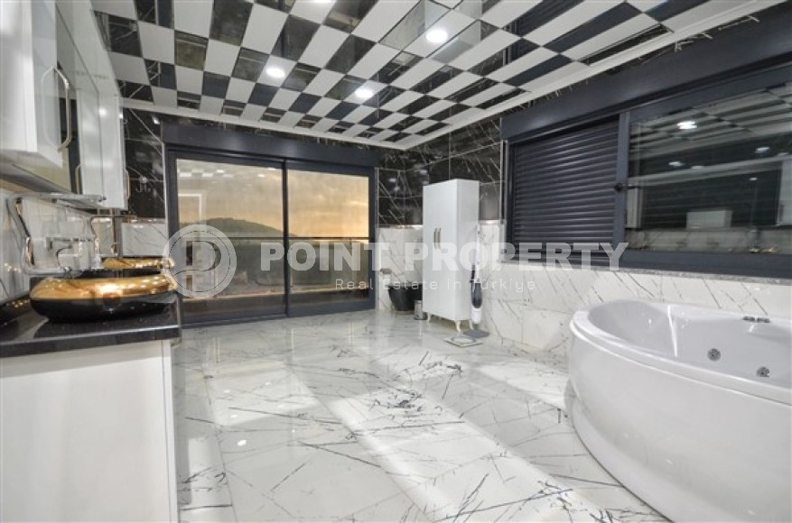 Роскошная вилла с шестью спальными комнатами и видовым открытым бассейном в районе Каргыджак-id-5128-фото-15