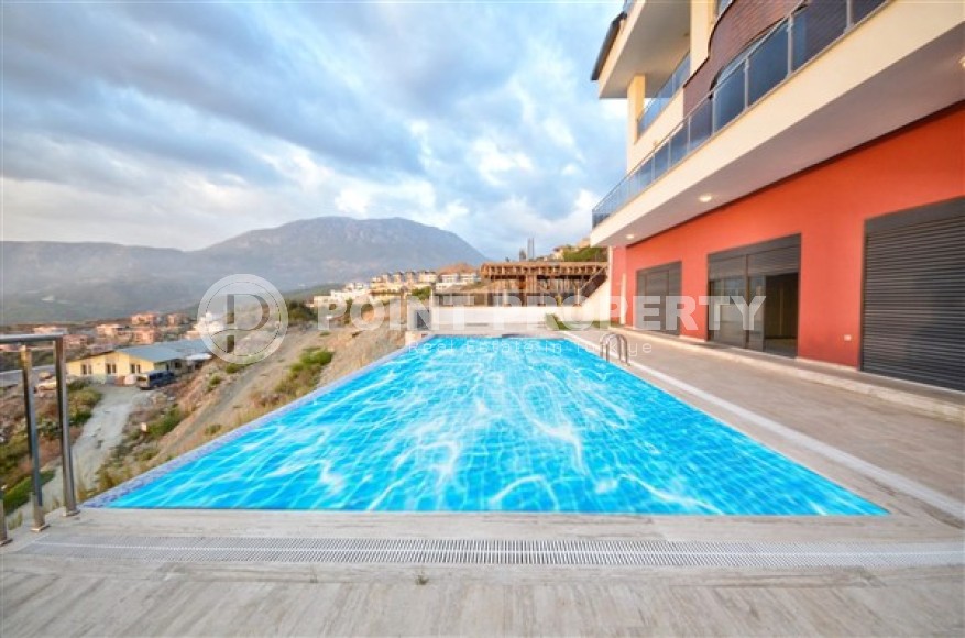 Роскошная вилла с шестью спальными комнатами и видовым открытым бассейном в районе Каргыджак-id-5128-фото-23