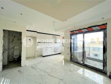 Двухуровневые апартаменты с двумя спальными комнатами в жилом комплексе на завершающем этапе строительства, в центре города Аланья-id-5129-фото-2