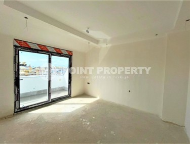 Двухуровневые апартаменты с двумя спальными комнатами в жилом комплексе на завершающем этапе строительства, в центре города Аланья-id-5129-фото-3