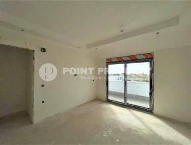 Двухуровневые апартаменты с двумя спальными комнатами в жилом комплексе на завершающем этапе строительства, в центре города Аланья-id-5129-фото-4