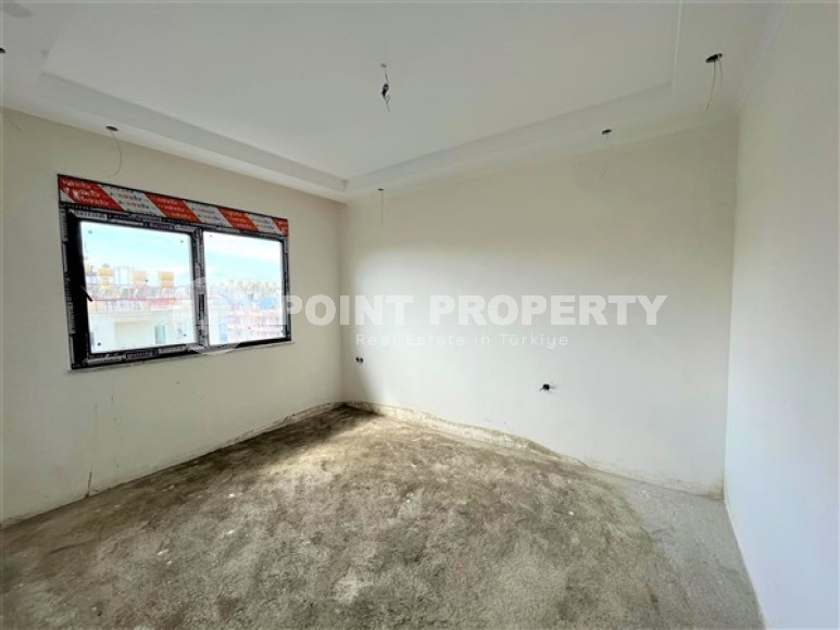 Двухуровневые апартаменты с двумя спальными комнатами в жилом комплексе на завершающем этапе строительства, в центре города Аланья-id-5129-фото-5