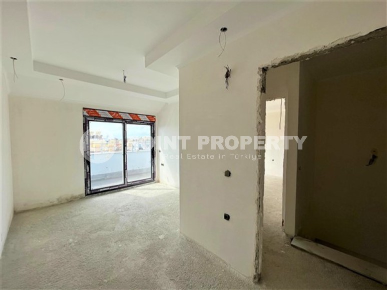 Двухуровневые апартаменты с двумя спальными комнатами в жилом комплексе на завершающем этапе строительства, в центре города Аланья-id-5129-фото-6