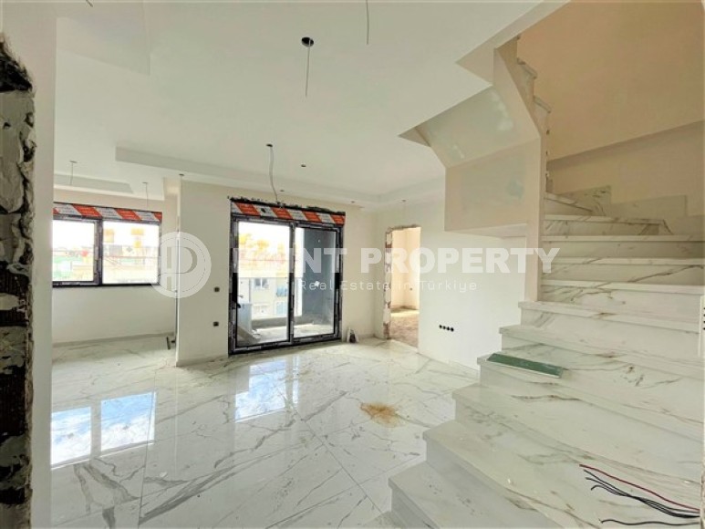 Двухуровневые апартаменты с двумя спальными комнатами в жилом комплексе на завершающем этапе строительства, в центре города Аланья-id-5129-фото-7