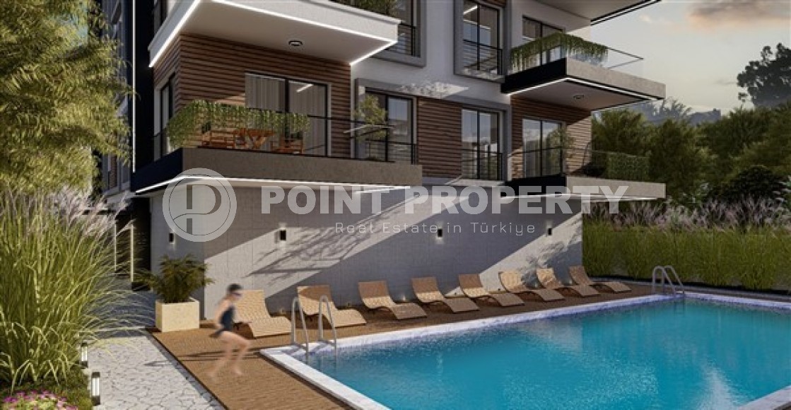 Небольшая квартира в жилом комплексе на этапе строительства в популярном районе Аланьи - Махмутлар-id-5132-фото-2