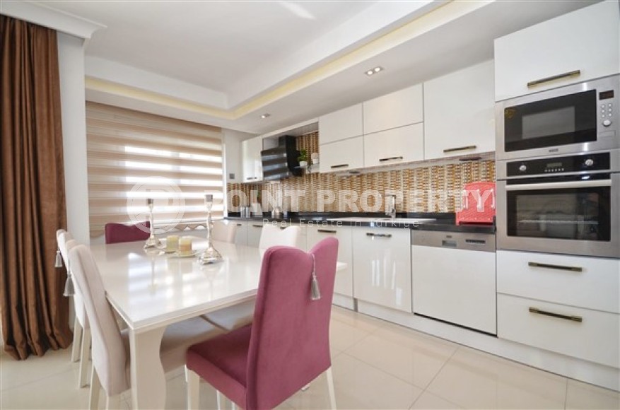 Comfortable apartment with a pleasant, bright interior in the center of the modern area of Alanya - Mahmutlar-id-5139-photo-4