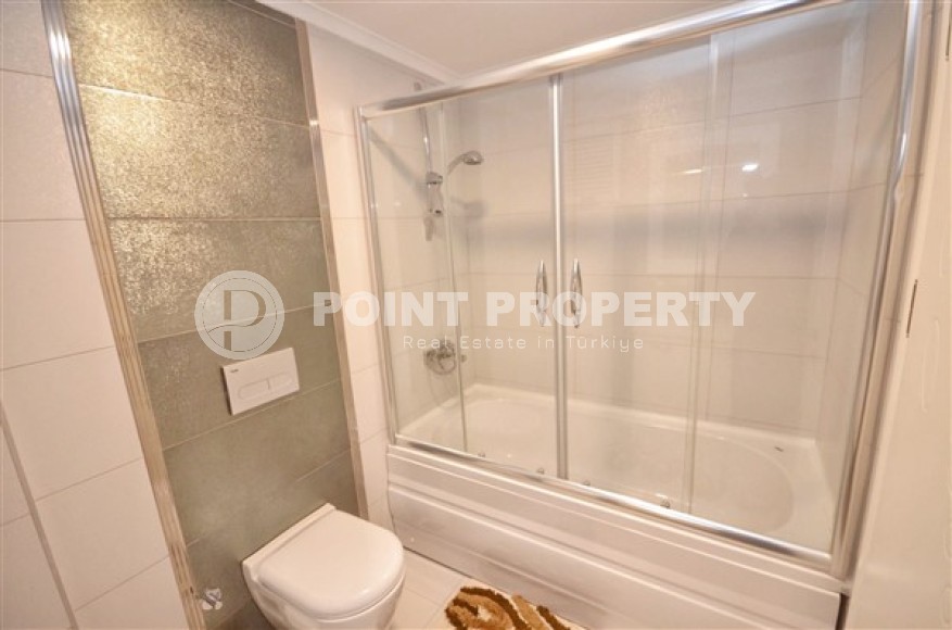 Comfortable apartment with a pleasant, bright interior in the center of the modern area of Alanya - Mahmutlar-id-5139-photo-11