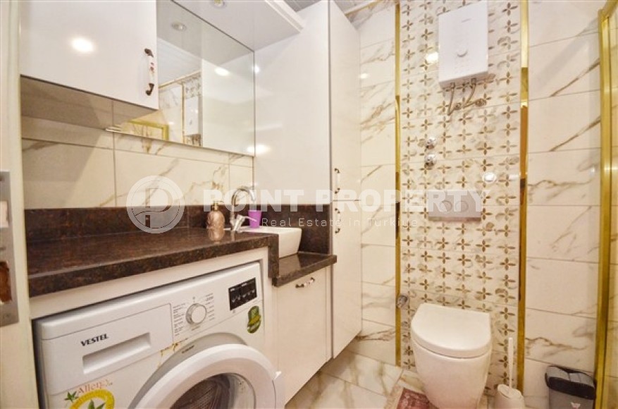 Modern apartment with two bedrooms, near the sea in the area of Alanya - Mahmutlar-id-5140-photo-10