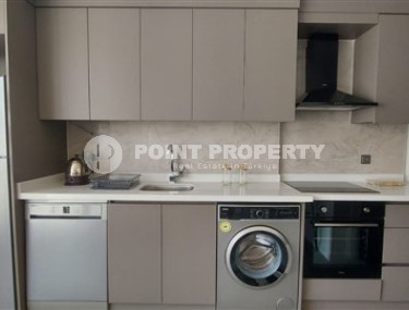 Современные апартаменты на 3-м этаже в доме 2021 года постройки в центре Аланьи-id-5156-фото-3