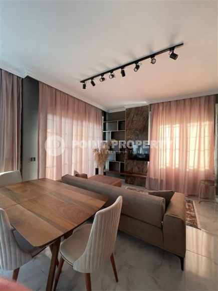 Стильная двухуровневая квартира с дизайнерским ремонтом на 9-м этаже с мансардой в районе Авсаллар-id-5157-фото-2