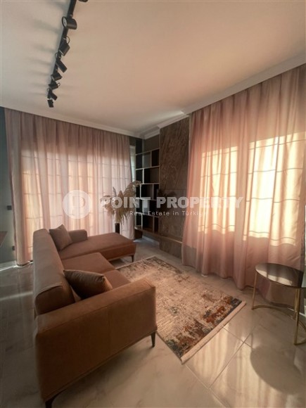 Стильная двухуровневая квартира с дизайнерским ремонтом на 9-м этаже с мансардой в районе Авсаллар-id-5157-фото-3