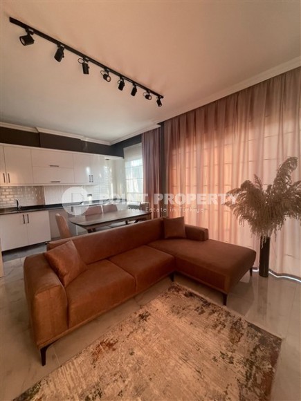 Стильная двухуровневая квартира с дизайнерским ремонтом на 9-м этаже с мансардой в районе Авсаллар-id-5157-фото-4