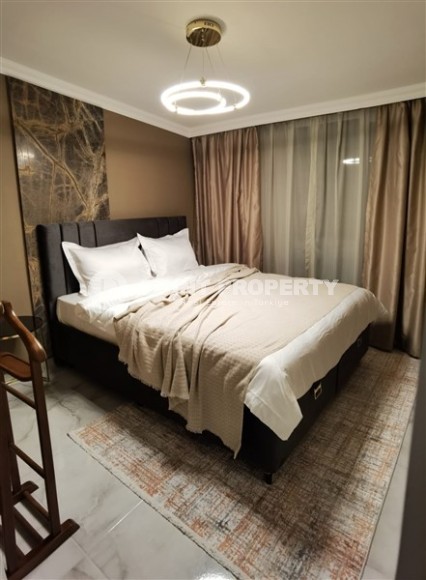 Стильная двухуровневая квартира с дизайнерским ремонтом на 9-м этаже с мансардой в районе Авсаллар-id-5157-фото-9