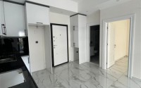 New apartment with fine finishing in the center of Alanya and 600 meters from the beach-id-5158-photo-4