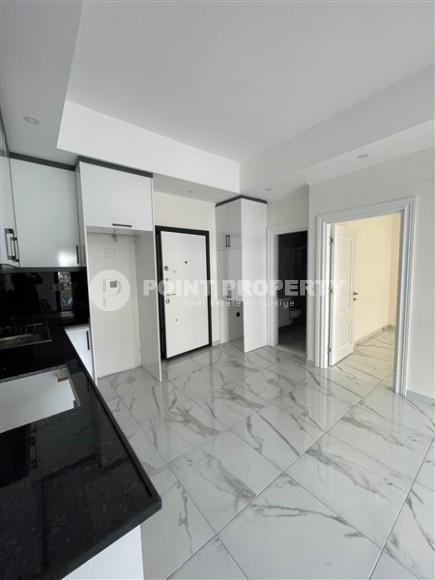 New apartment with fine finishing in the center of Alanya and 600 meters from the beach-id-5158-photo-4