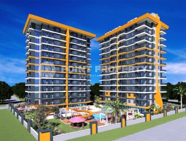 Апартаменты в новом жилом комплексе, введенном в эксплуатацию в мае 2023 года в самом центре района Махмутлар-id-5187-фото-1