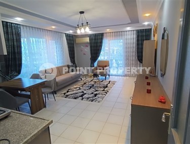 Комфортабельная квартира 2+1, общей площадью 120 м2, в центре зеленого благоустроенного района Аланьи - Тосмур-id-5204-фото-1