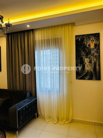 New 1+1 apartment, with a total area of 60 m2, 400 meters from the sea, in the center of Mahmutlar-id-5207-photo-2