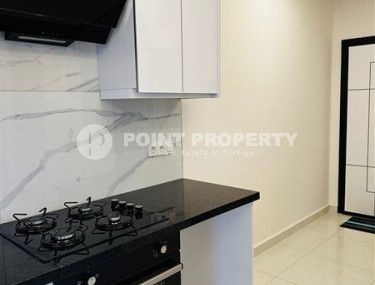 New 1+1 apartment, with a total area of 60 m2, 400 meters from the sea, in the center of Mahmutlar-id-5207-photo-5