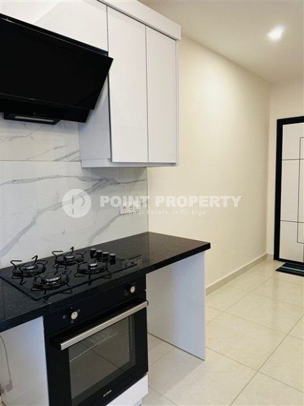 New 1+1 apartment, with a total area of 60 m2, 400 meters from the sea, in the center of Mahmutlar-id-5207-photo-5