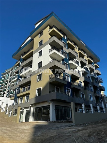 New 1+1 apartment, with a total area of 60 m2, 400 meters from the sea, in the center of Mahmutlar-id-5207-photo-6