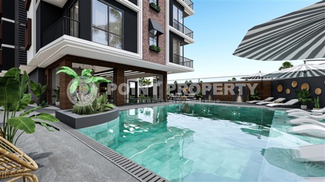 Apartment with two bedrooms, in a residential complex at the final stage of construction, near the sea, in the center of Alanya-id-5219-photo-4