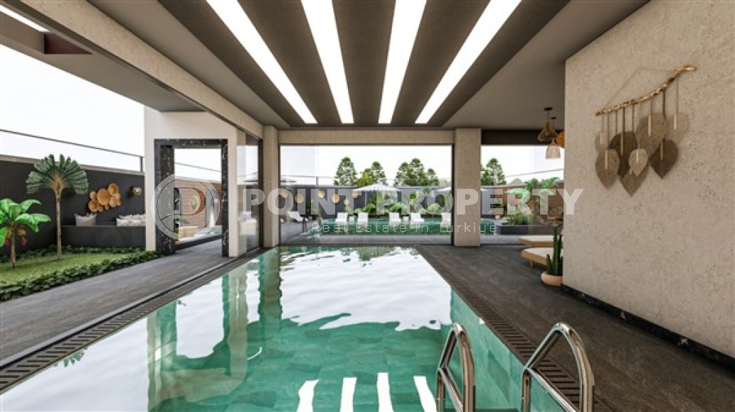 Apartment with two bedrooms, in a residential complex at the final stage of construction, near the sea, in the center of Alanya-id-5219-photo-9