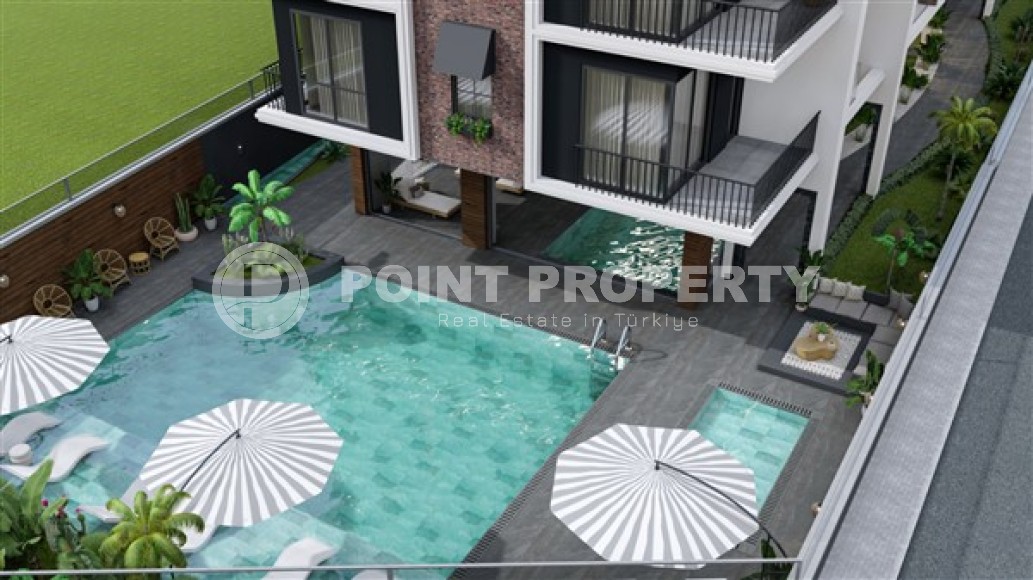 Apartment with two bedrooms, in a residential complex at the final stage of construction, near the sea, in the center of Alanya-id-5219-photo-13