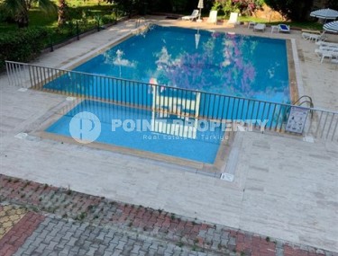 Cozy apartment with two bedrooms in a residential complex with a beautiful garden in the Mahmutlar area-id-5224-photo-1