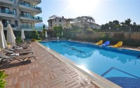Stylish modern 1+1 apartment, with a total area of 60 m2, in a green, picturesque residential complex with a landscaped park-id-5230-photo-9