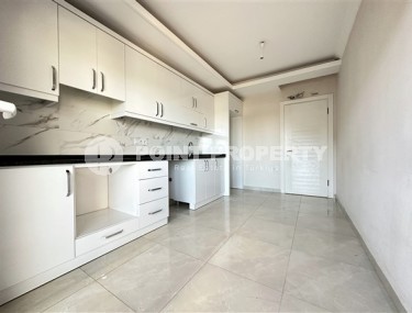 Bright, unfurnished apartment with two bedrooms and a separate kitchen, with the possibility of obtaining citizenship, in the upper Oba area-id-5245-photo-2