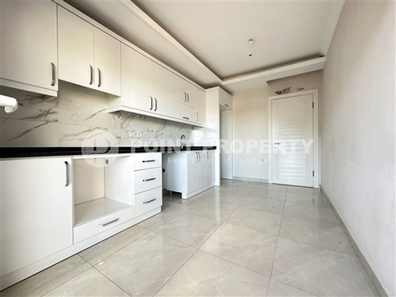 Bright, unfurnished apartment with two bedrooms and a separate kitchen, with the possibility of obtaining citizenship, in the upper Oba area-id-5245-photo-2