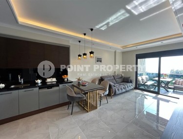 Стильные небольшие апартаменты с одной спальной комнатой, в современном жилом комплексе с инфраструктурой отельного типа, в районе Каргыджак-id-5246-фото-4