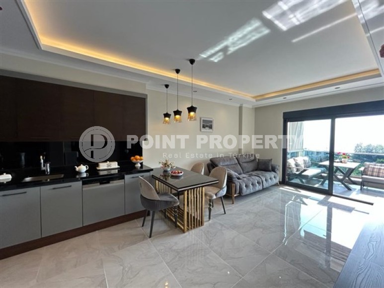 Стильные небольшие апартаменты с одной спальной комнатой, в современном жилом комплексе с инфраструктурой отельного типа, в районе Каргыджак-id-5246-фото-4