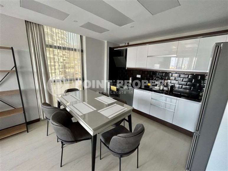 Apartment with three bedrooms and views of the Mediterranean Sea, in a modern residential complex built in 2022, in the Mahmutlar area-id-5268-photo-2