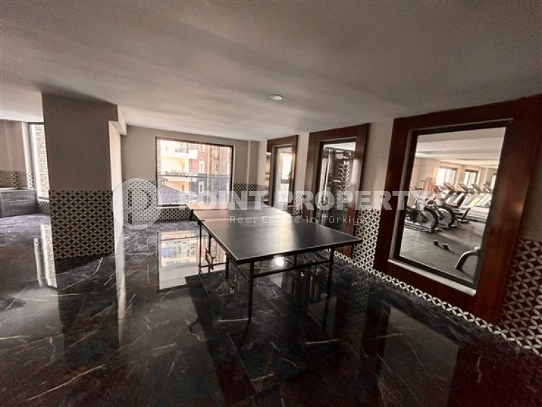 Apartment with three bedrooms and views of the Mediterranean Sea, in a modern residential complex built in 2022, in the Mahmutlar area-id-5268-photo-14