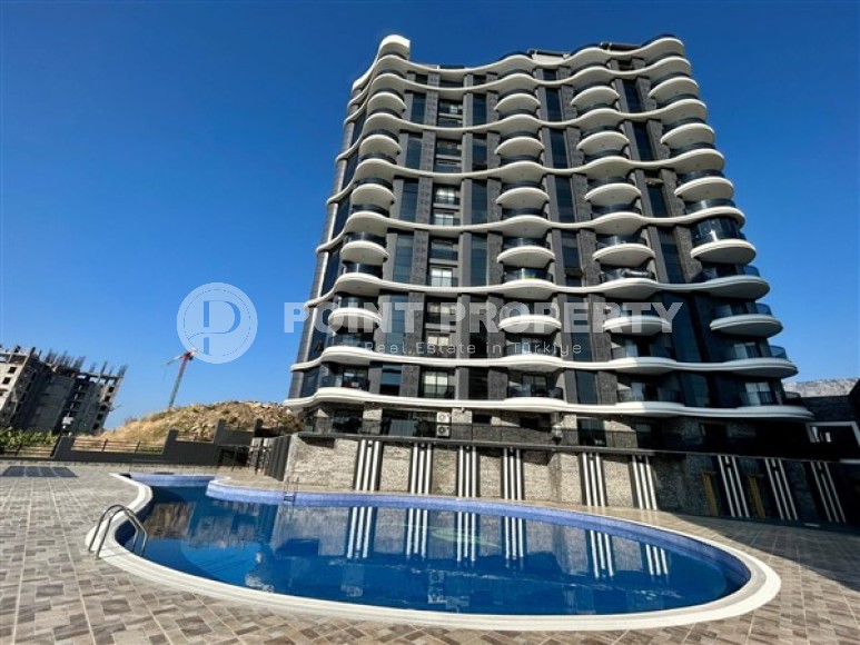 Apartment with three bedrooms and views of the Mediterranean Sea, in a modern residential complex built in 2022, in the Mahmutlar area-id-5268-photo-22