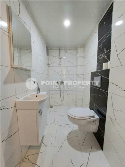 Apartments with modern design, high-quality renovation, new furniture and household appliances in the center of Mahmutlar-id-5305-photo-10