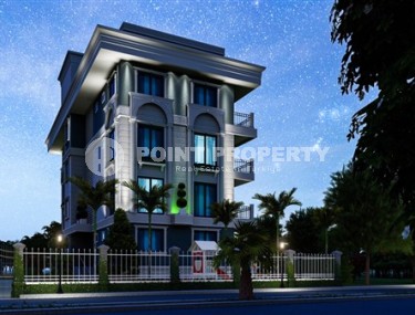 Квартиры 2+1 и дуплексы, общей площадью от 73 до 83 м2, в километре от моря в районе Демирташ-id-5307-фото-4