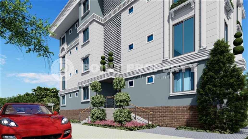 Квартиры 2+1 и дуплексы, общей площадью от 73 до 83 м2, в километре от моря в районе Демирташ-id-5307-фото-6