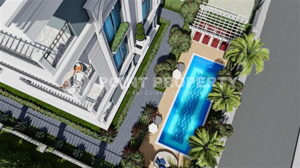 Квартиры 2+1 и дуплексы, общей площадью от 73 до 83 м2, в километре от моря в районе Демирташ-id-5307-фото-8