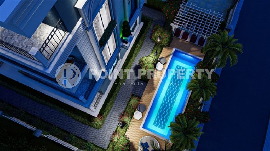 Квартиры 2+1 и дуплексы, общей площадью от 73 до 83 м2, в километре от моря в районе Демирташ-id-5307-фото-9