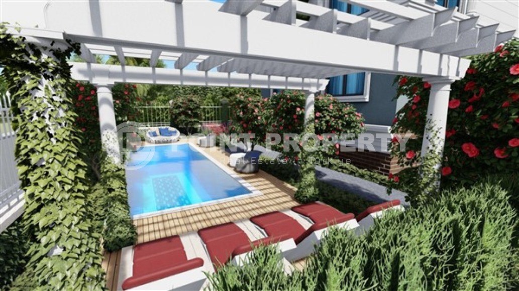 Квартиры 2+1 и дуплексы, общей площадью от 73 до 83 м2, в километре от моря в районе Демирташ-id-5307-фото-10