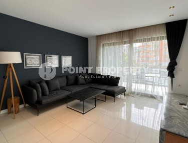 Стильная квартира с современным дизайном на 1-м этаже в жилом комплексе 2017 года постройки, в центре района Оба-id-5309-фото-2