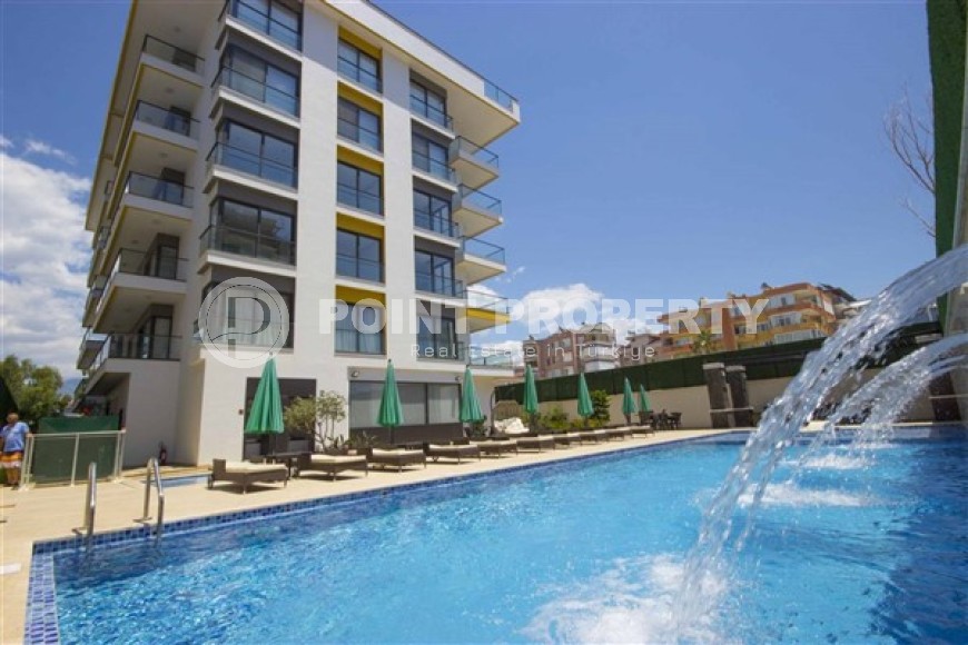 Стильная квартира с современным дизайном на 1-м этаже в жилом комплексе 2017 года постройки, в центре района Оба-id-5309-фото-17