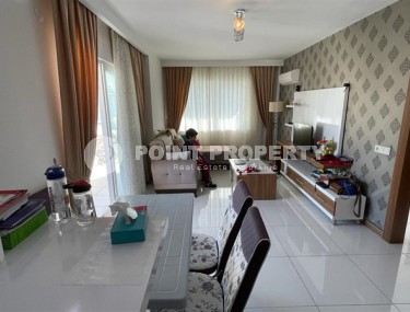 Small furnished apartment with one bedroom, near the sea with views of the Taurus Mountains, in the Mahmutlar area-id-5310-photo-1