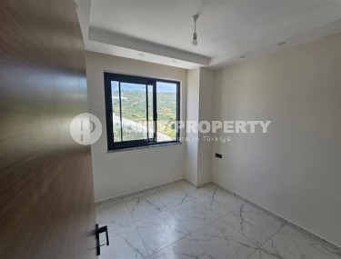 Small apartments, 1+1 layout, in a new residential complex built in 2023, in the Mahmutlar area-id-5312-photo-2