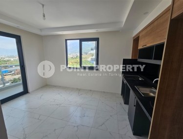 Small apartments, 1+1 layout, in a new residential complex built in 2023, in the Mahmutlar area-id-5312-photo-3