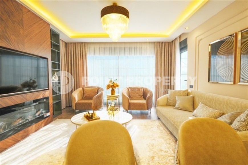 Новые благоустроенные апартаменты с тремя спальными комнатами в центральном районе города Аланья-id-5313-фото-2