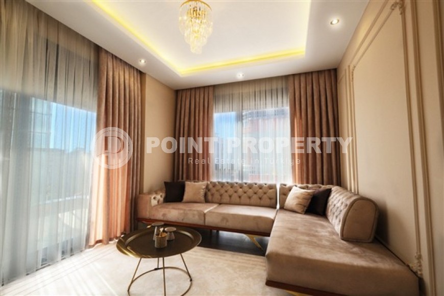 Новые благоустроенные апартаменты с тремя спальными комнатами в центральном районе города Аланья-id-5313-фото-3